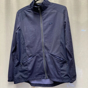 Woman’s red face blue mesh golf jacket